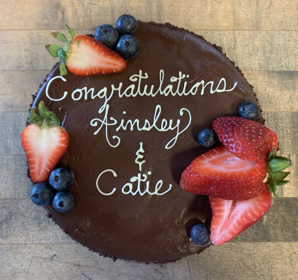 chocolate raspberry cake with writing